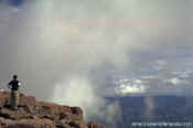 Stranger enjoying the view from the summit
